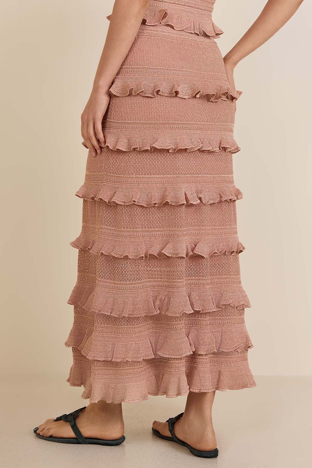 תמונת דוגמן אחורית של חצאית מידי מלמלה