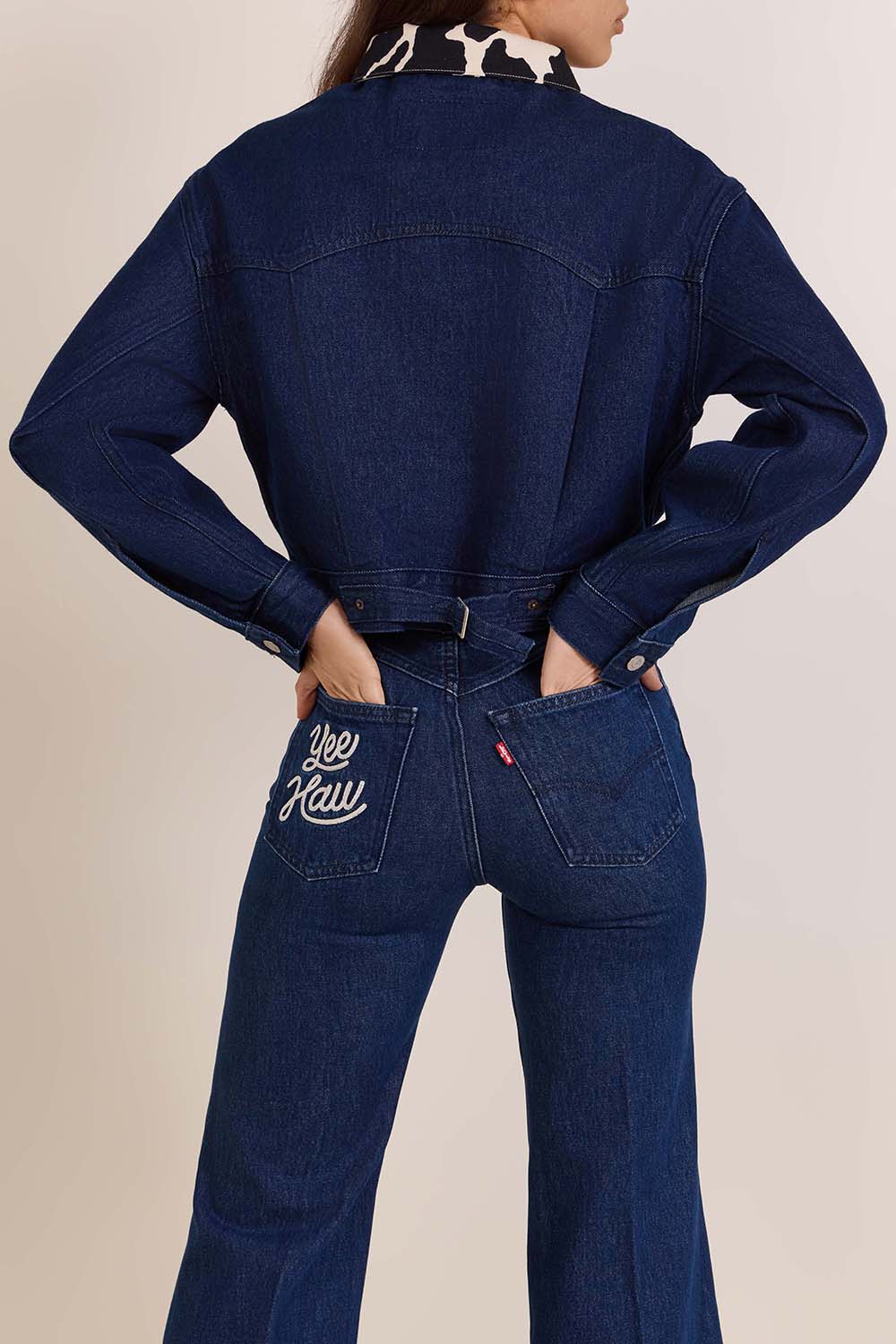 תמונת דוגמן אחורית של ליוויס X צעצוע של סיפור ז'קט ג'ינס