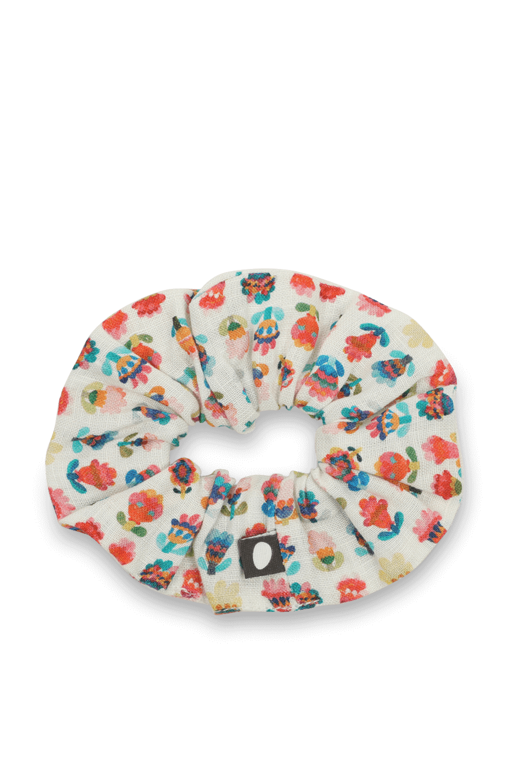 תמונה קידמית של גומיה לשיער מפשתן עם פרינט פרחוני