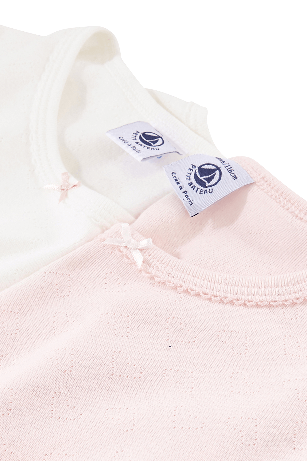 תמונת תקריב של סט זוג חולצות קצרות בגווני ורוד ולבן - גילאי 2-12