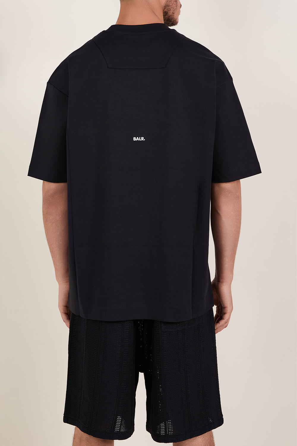 תמונת דוגמן אחורית של חולצת טי