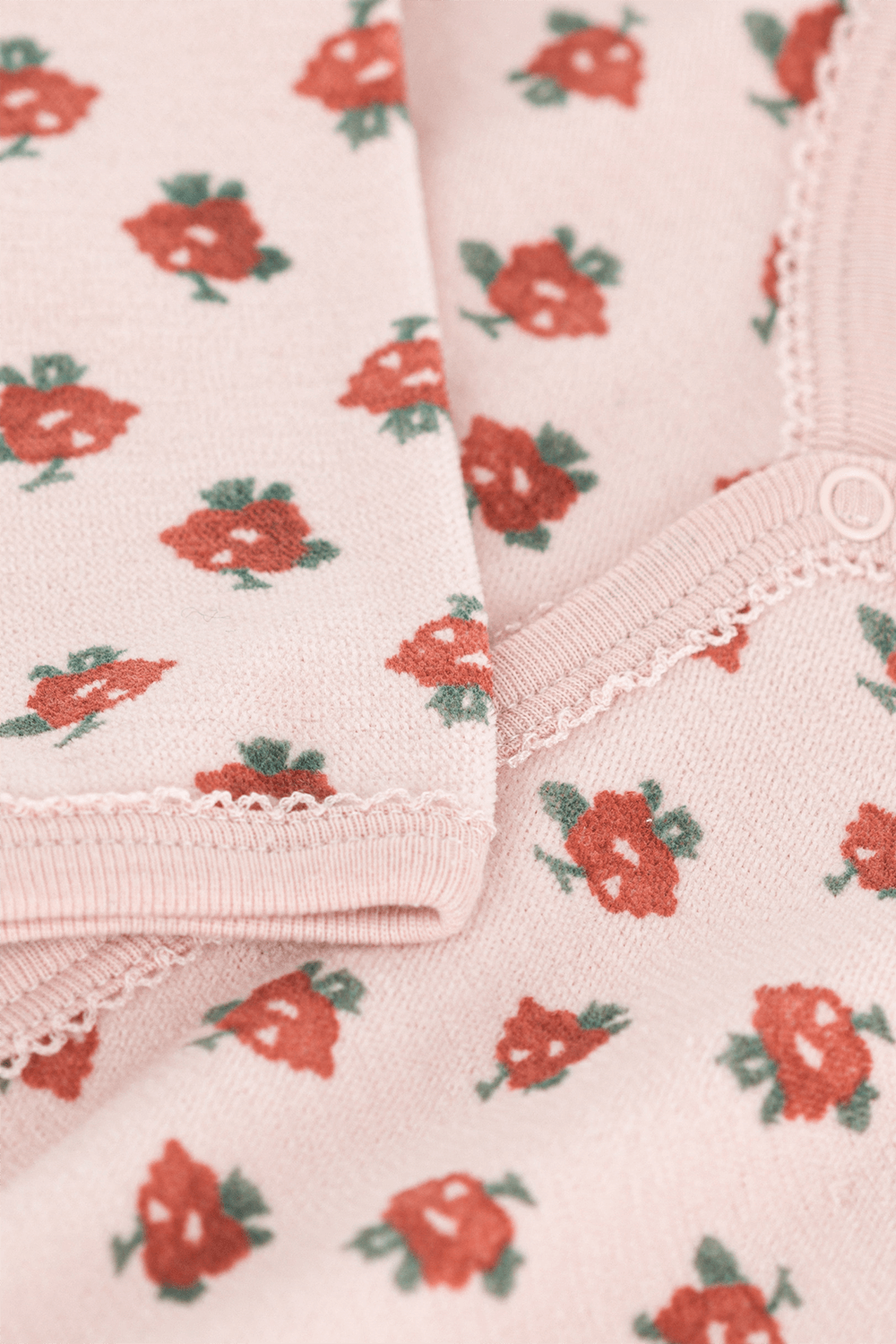 תמונה אחורית של אוברול פרחים עם רגליות - גילאי 1-24 חודשים