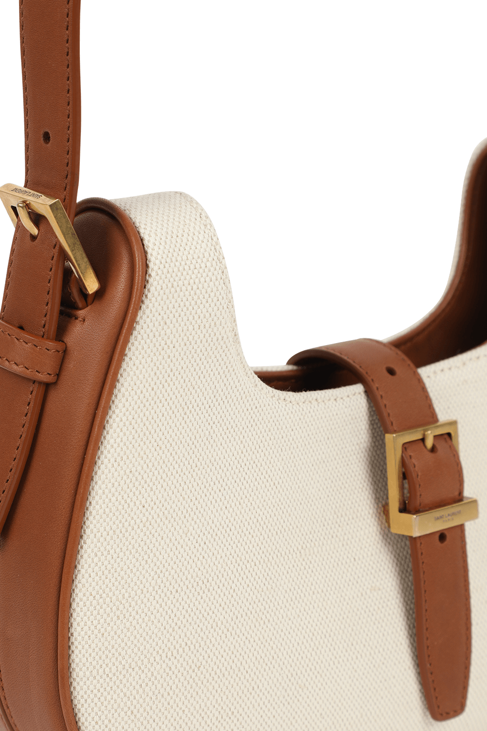 תמונת תקריב של תיק לו פורמר בגווני לבן וחום