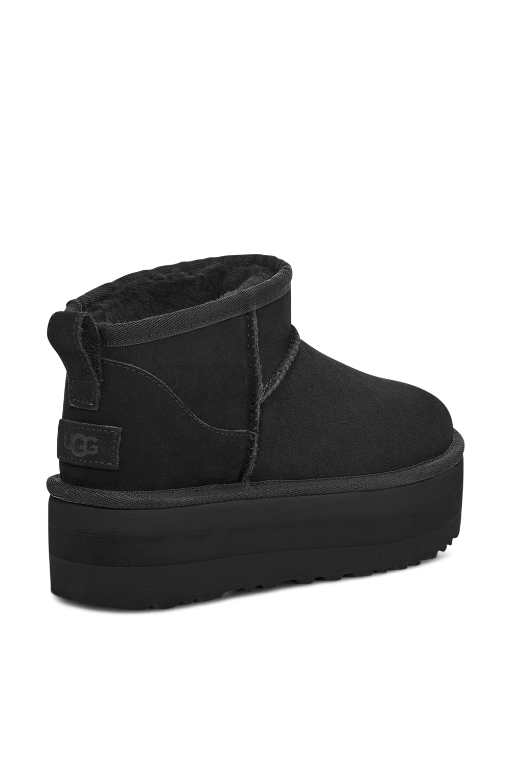 תמונת תקריב של מגפוני קלאסיק מיני עם עקב פלטפורמה