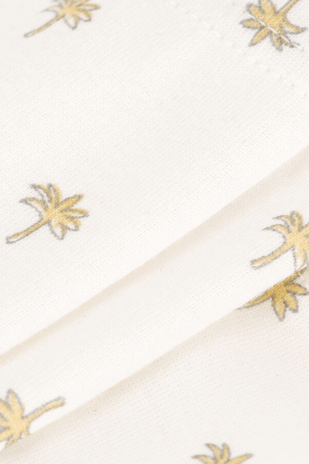 תמונת תקריב של מכנסי טייץ עם דקלים - גילאי 18-36 חודשים