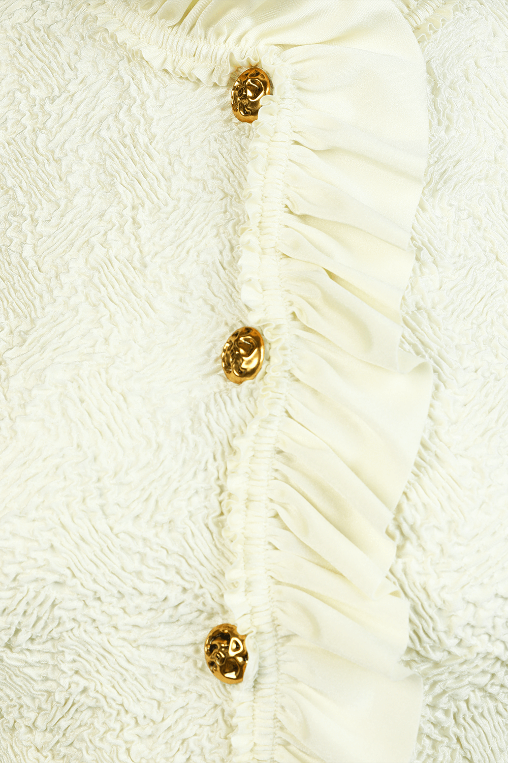 תמונה אחורית של ז'קט אופנה עם סלסולים וכפתורי זהב