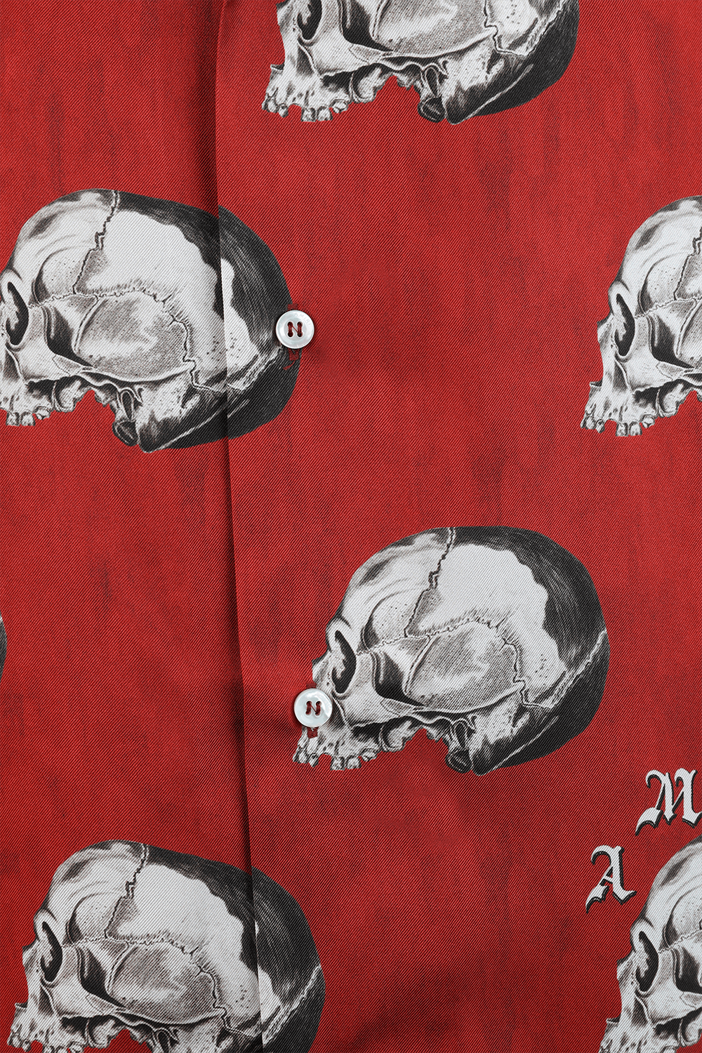 תמונה אחורית של חולצה מכופתרת קצרה ממשי עם הדפס גולגולות