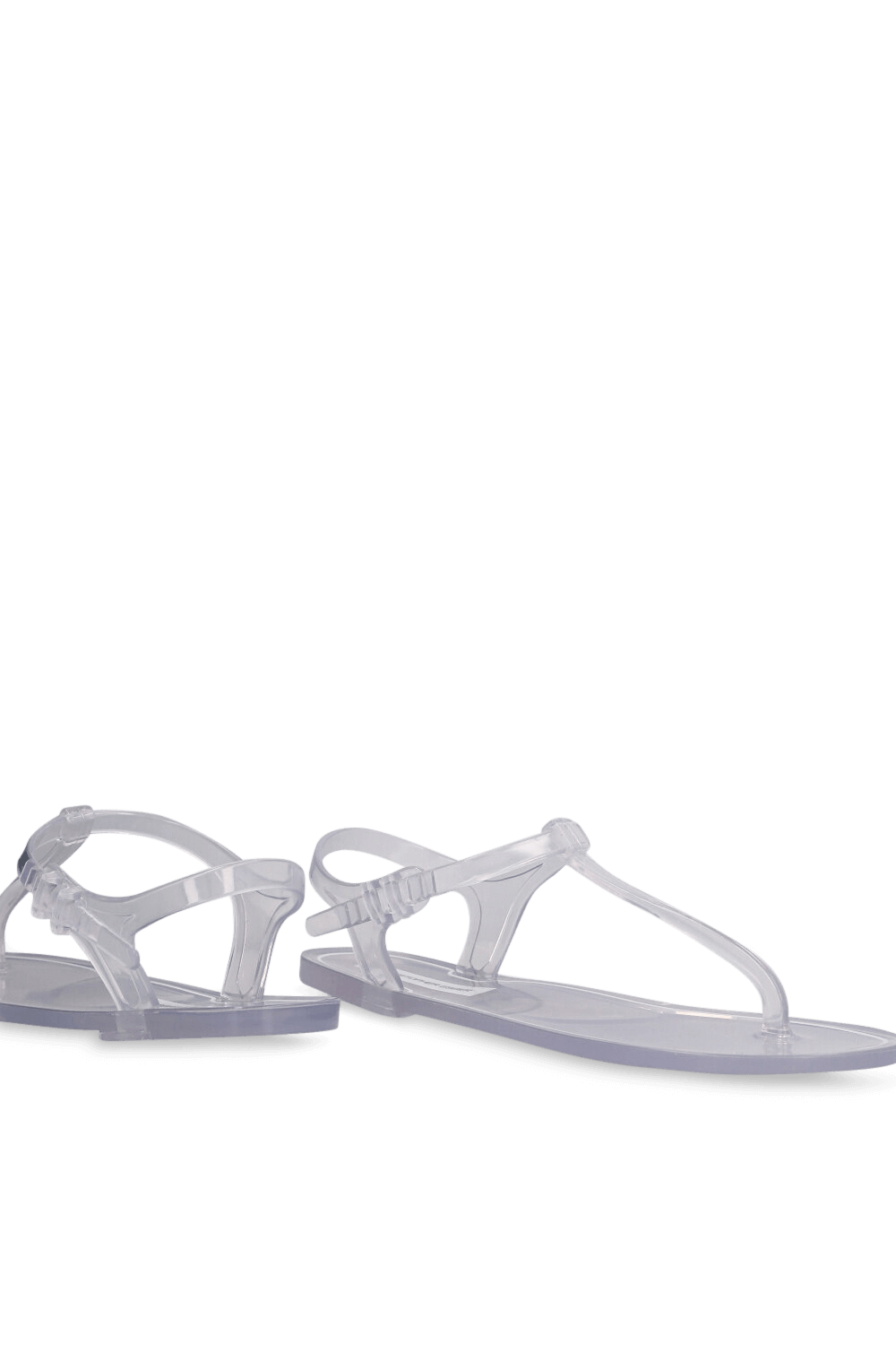 תמונת תקריב של סנדלי אצבע שקופים