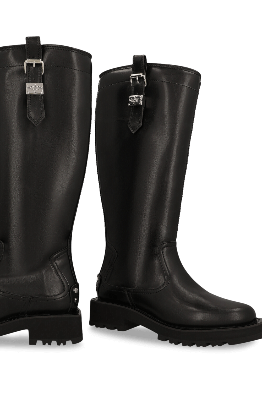 תמונת תקריב של מגפי ברך מעור טבעוני