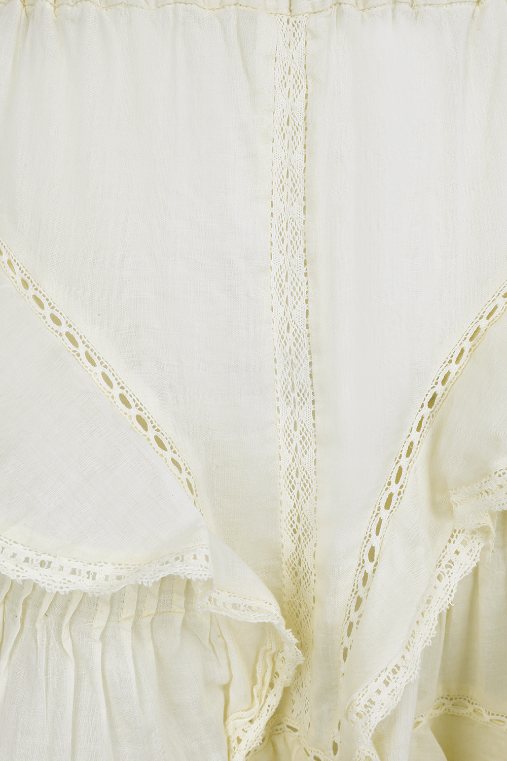 תמונה אחורית של חצאית מיני מכותנה עם רקמה