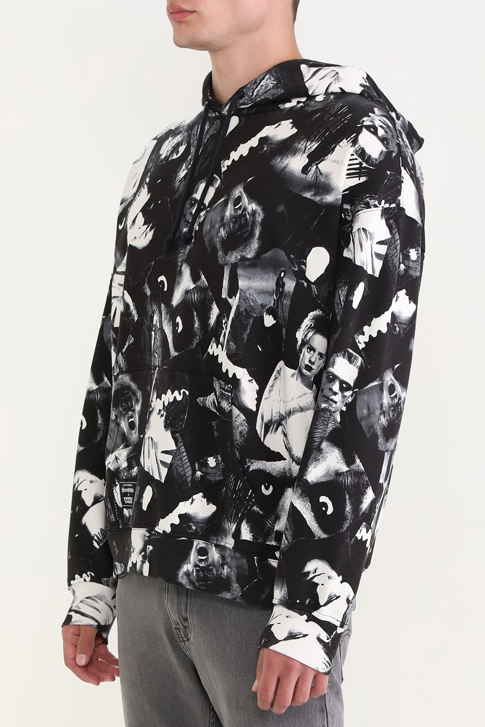 תמונת דוגמן קידמית של ליוייס X מפלצות יוניברסל סווטשירט קפוצ'ון