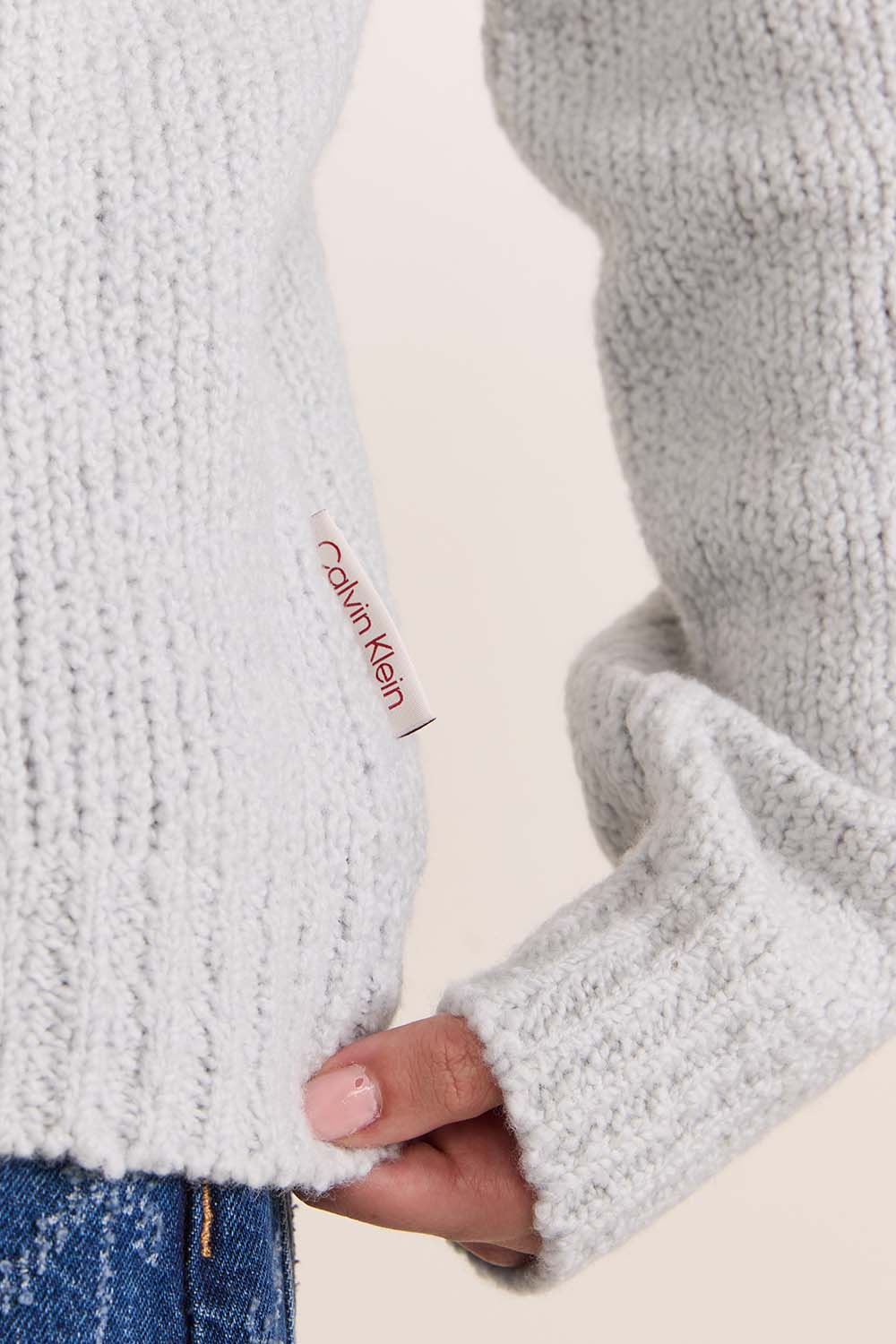 תמונת תקריב דוגמן של סריג פולו צמר