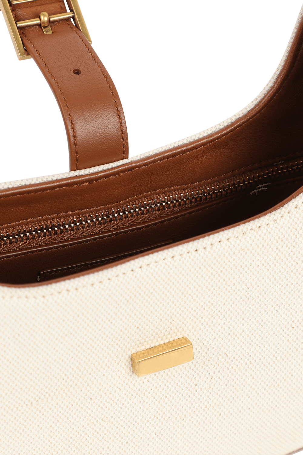 תמונת פנים של תיק לו פורמר בגווני לבן וחום