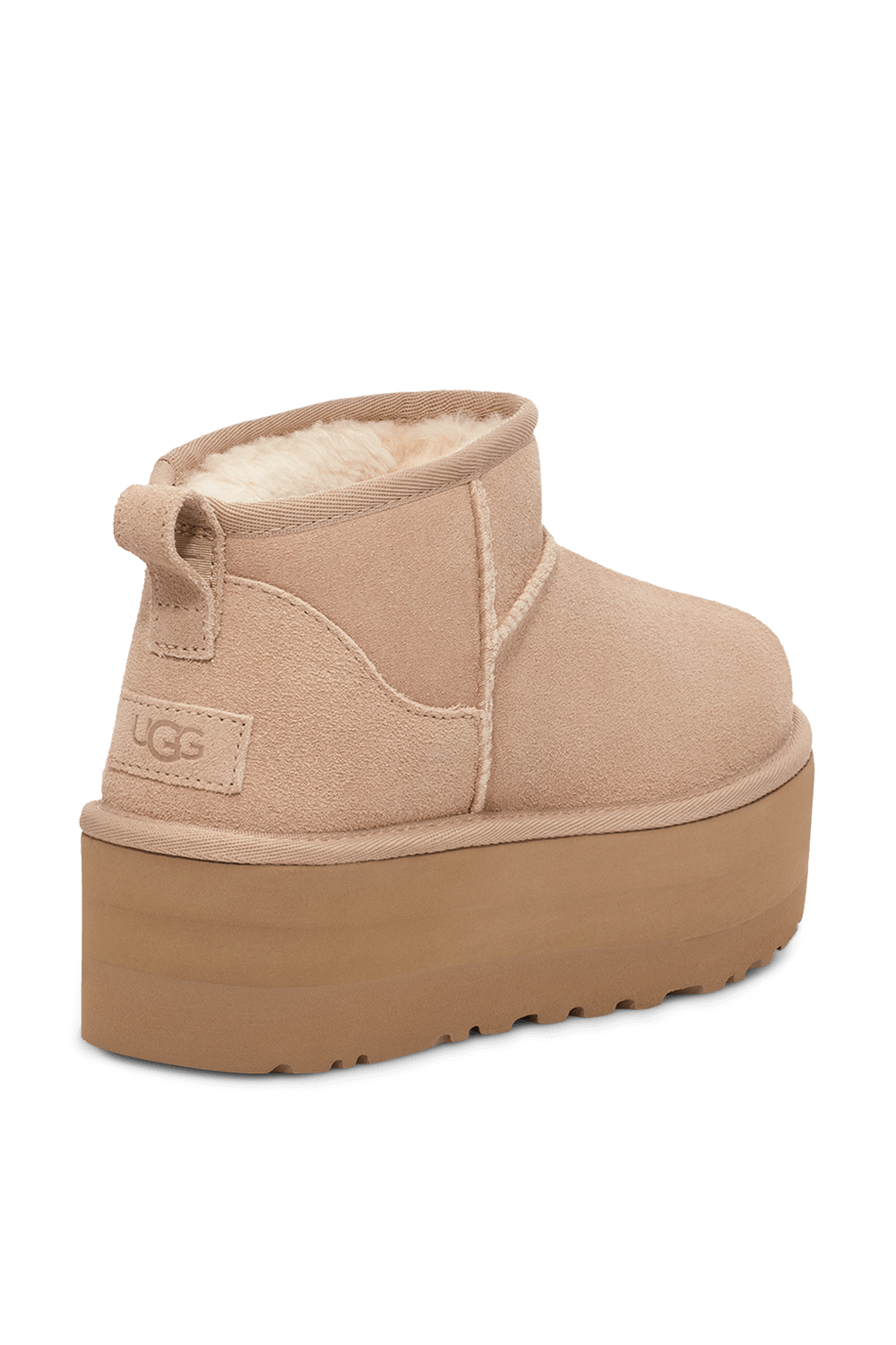 תמונת תקריב של מגפוני קלאסיק מיני עם עקב פלטפורמה