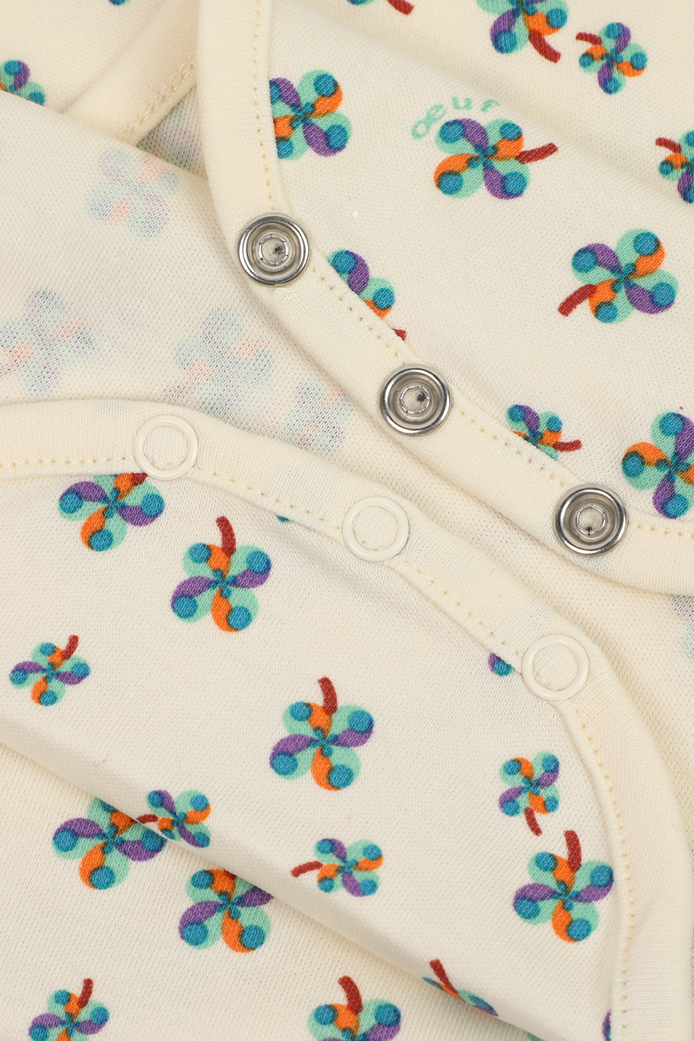 תמונה אחורית של גילאי 6-18 חודשים וואנזי עם הדפס פרחוני