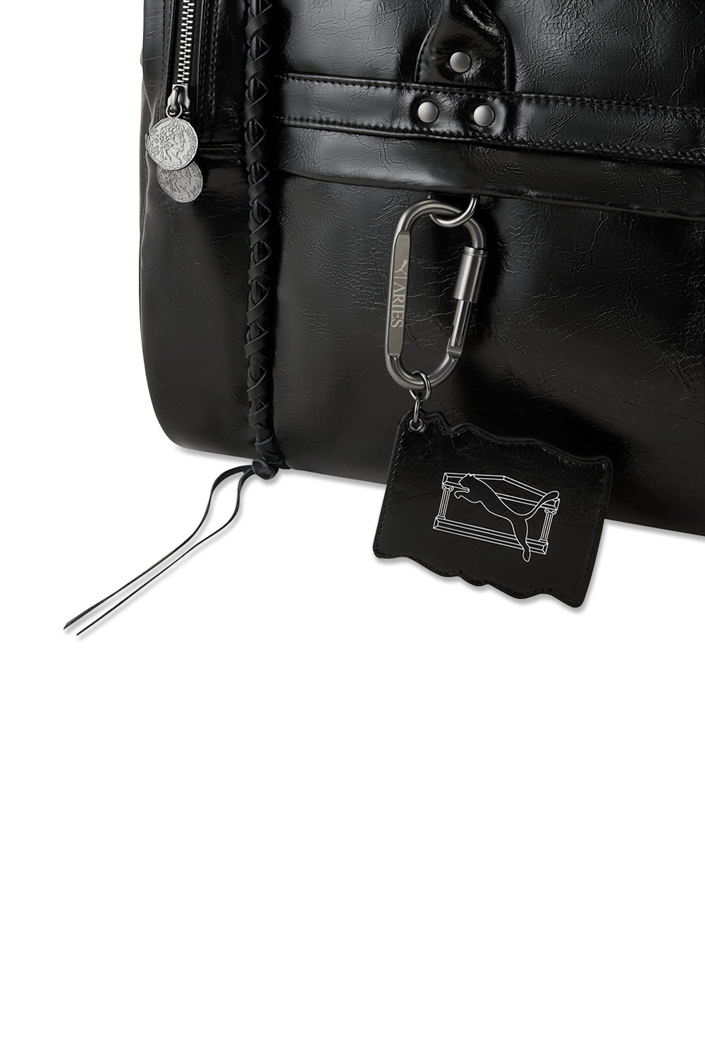 תמונת תקריב של פומה X אריאס תיק דאפל