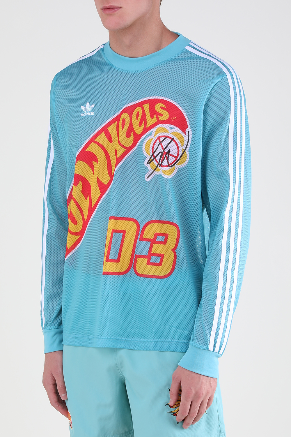 תמונת דוגמן קידמית של אדידס X שון ווטרספון והוט הילס חולצת רשת ארוכה