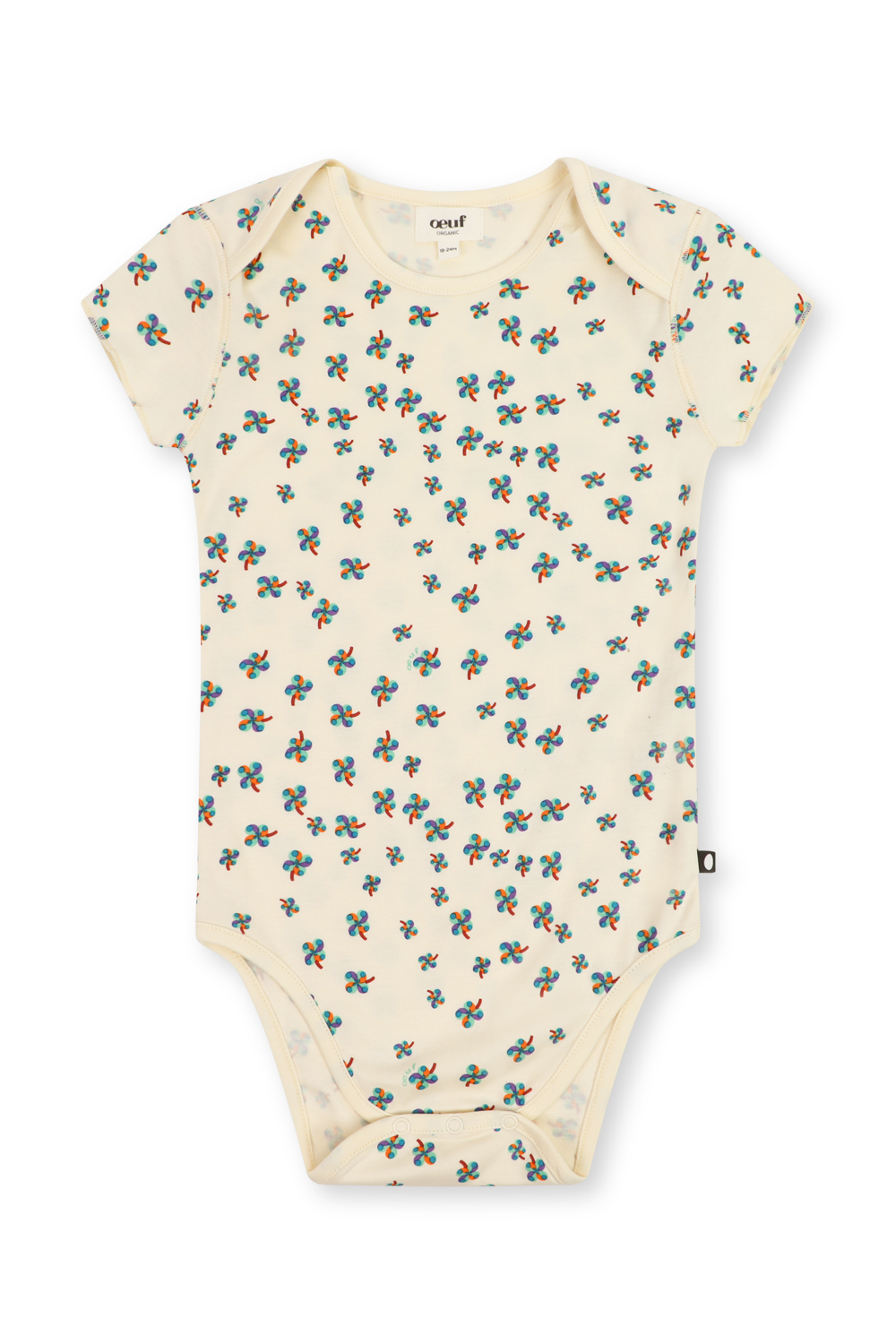 תמונה קידמית של גילאי 6-18 חודשים וואנזי עם הדפס פרחוני