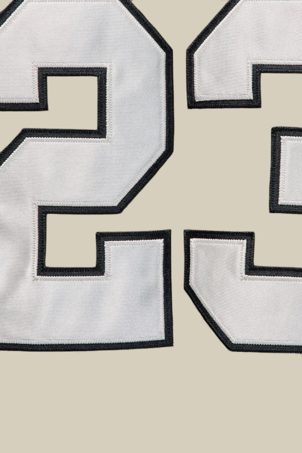 תמונת תקריב דוגמן של חולצת הוקי אוברסייז נייקי ג'ורדן X רילטריי