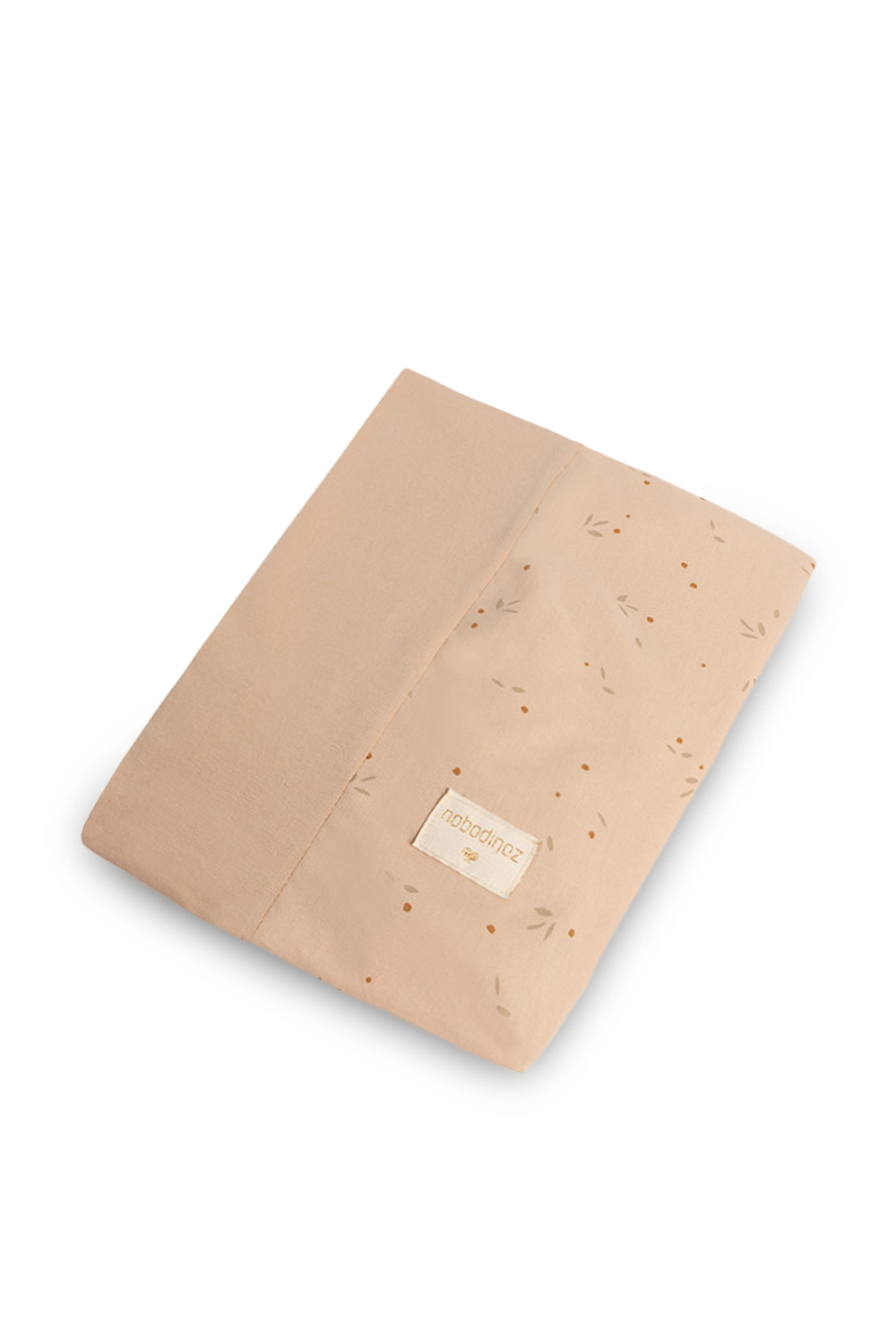 תמונת תקריב של סדין למשטח החתלה עם הדפס פרחוני