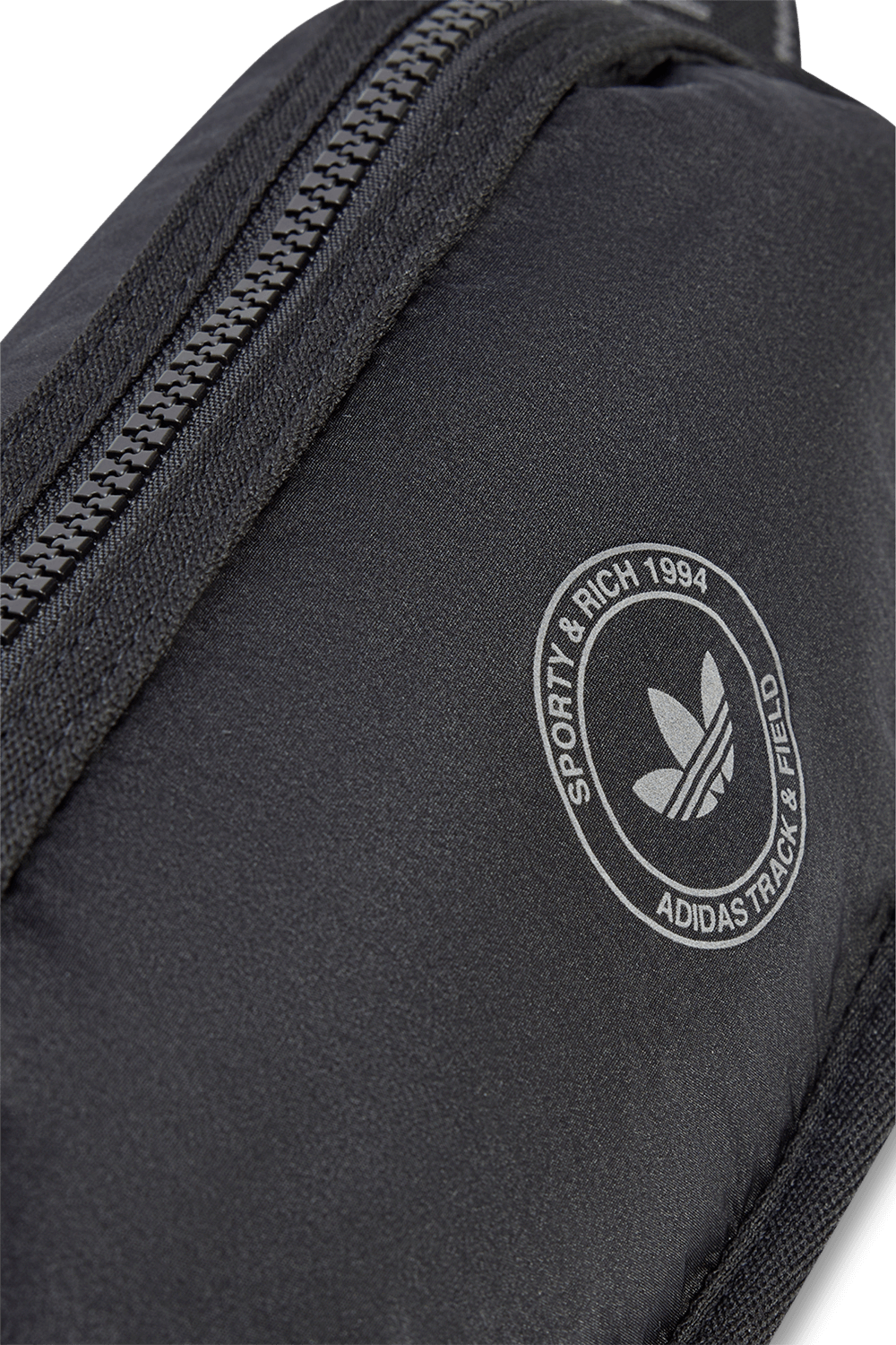 תמונת תקריב של תיק פאוץ' אדידס X ספורטי אנד ריץ'