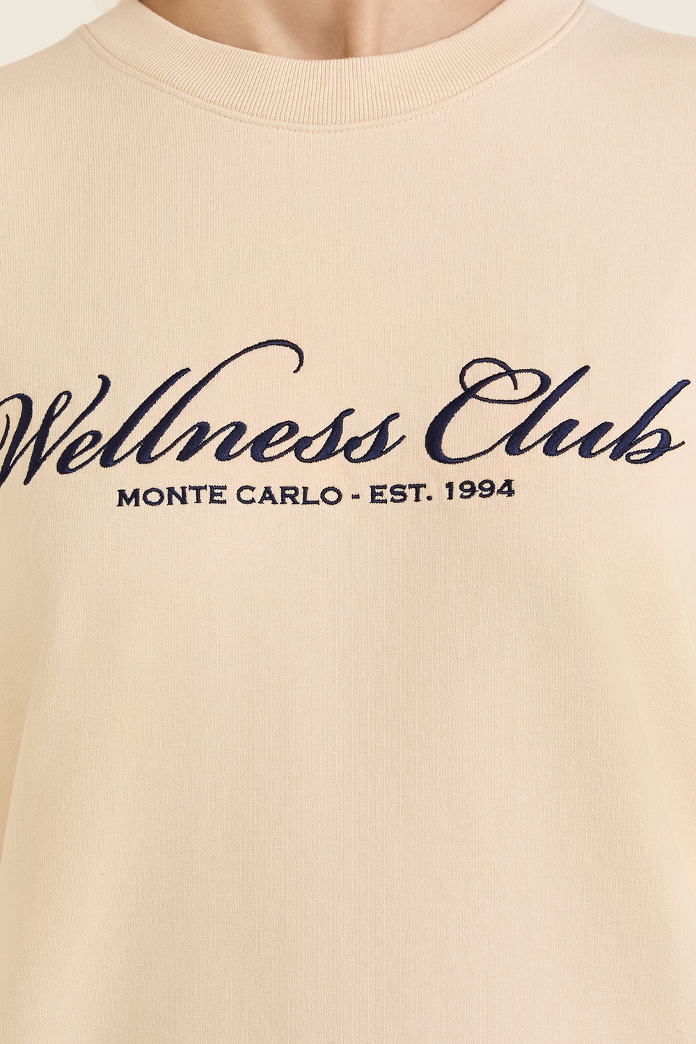 תמונת תקריב דוגמן של סווטשירט וולנס קלאב