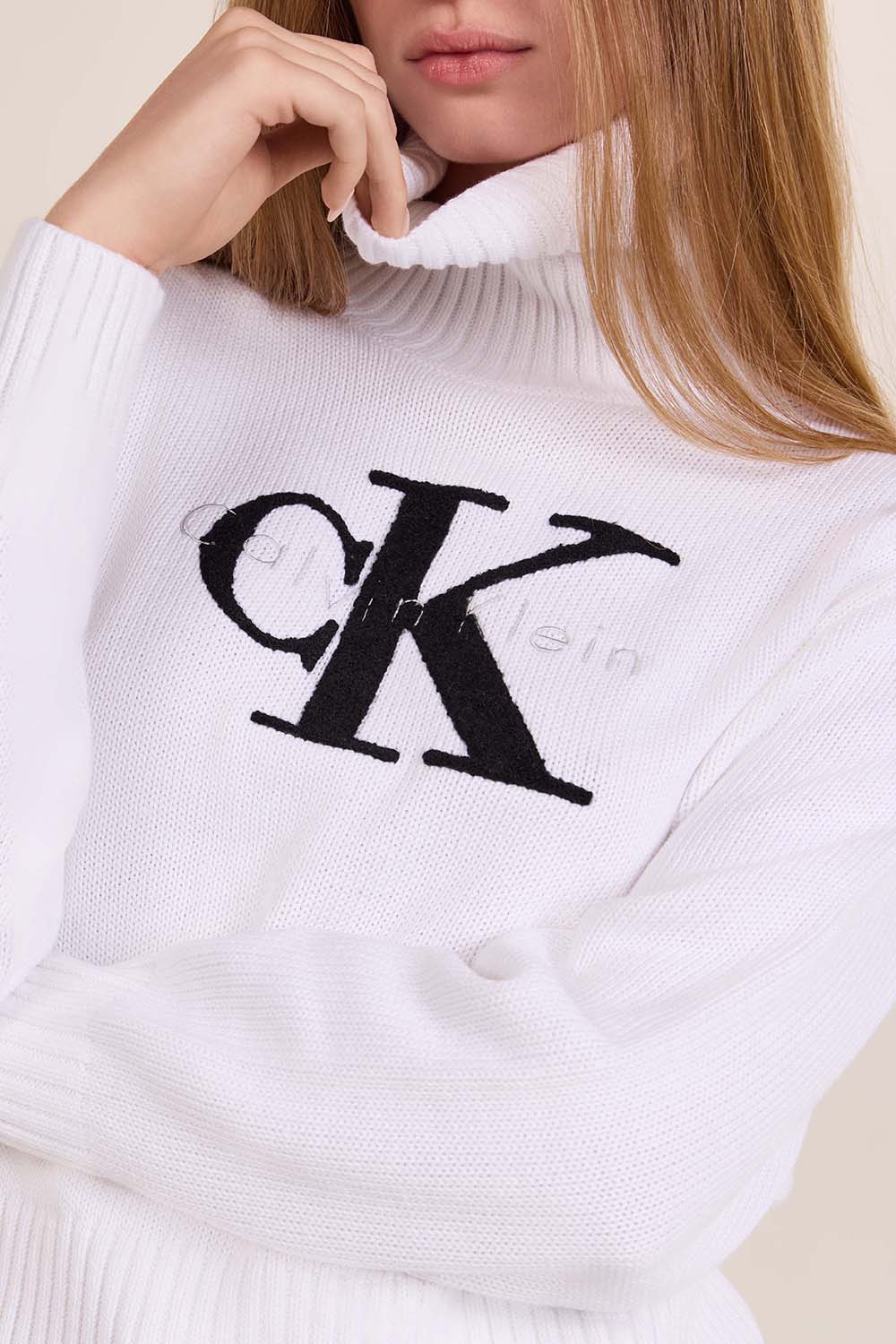 תמונת תקריב דוגמן של סוודר גולף