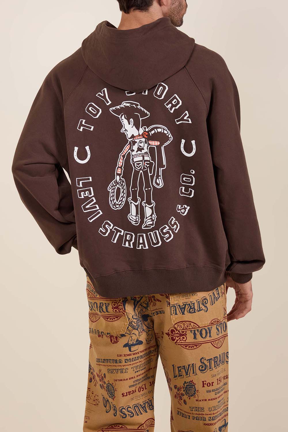 תמונת דוגמן אחורית של ליוויס X צעצוע של סיפור סווטשירט קפוצ'ון