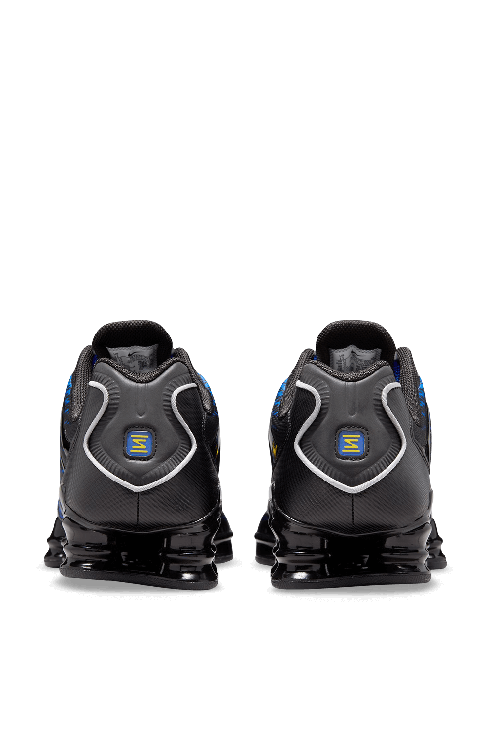 תמונה אחורית של נעלי סניקרס שוקס טי.אל