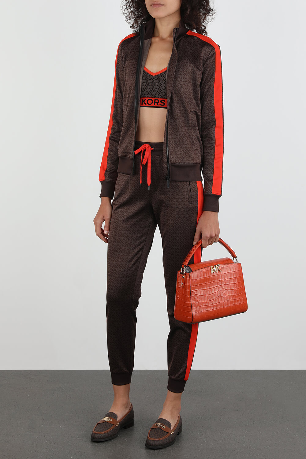 תמונת דוגמן קידמית של תיק צד מעור קרקו בצבע כתום אפרסק